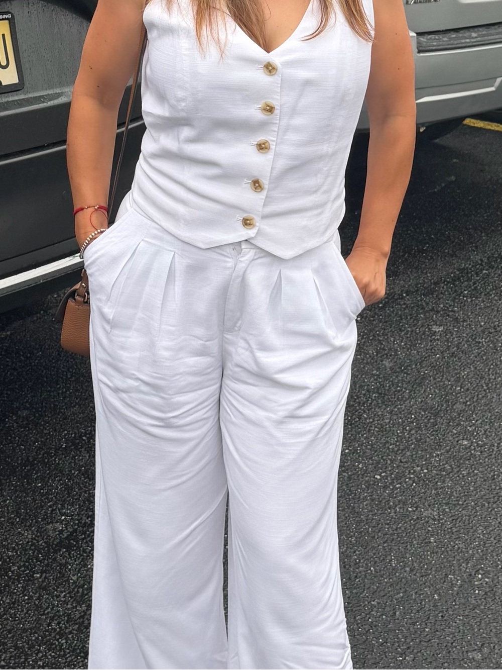 Women's White Sleeveless Button-Front Jumpsuit